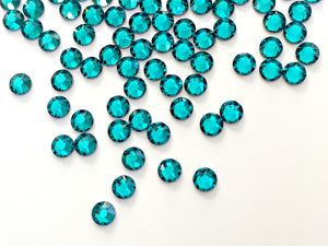 Swarovski® 2058 Small Pack Glue On Crystals: SS5 BLUE ZIRCON - Glitz It
